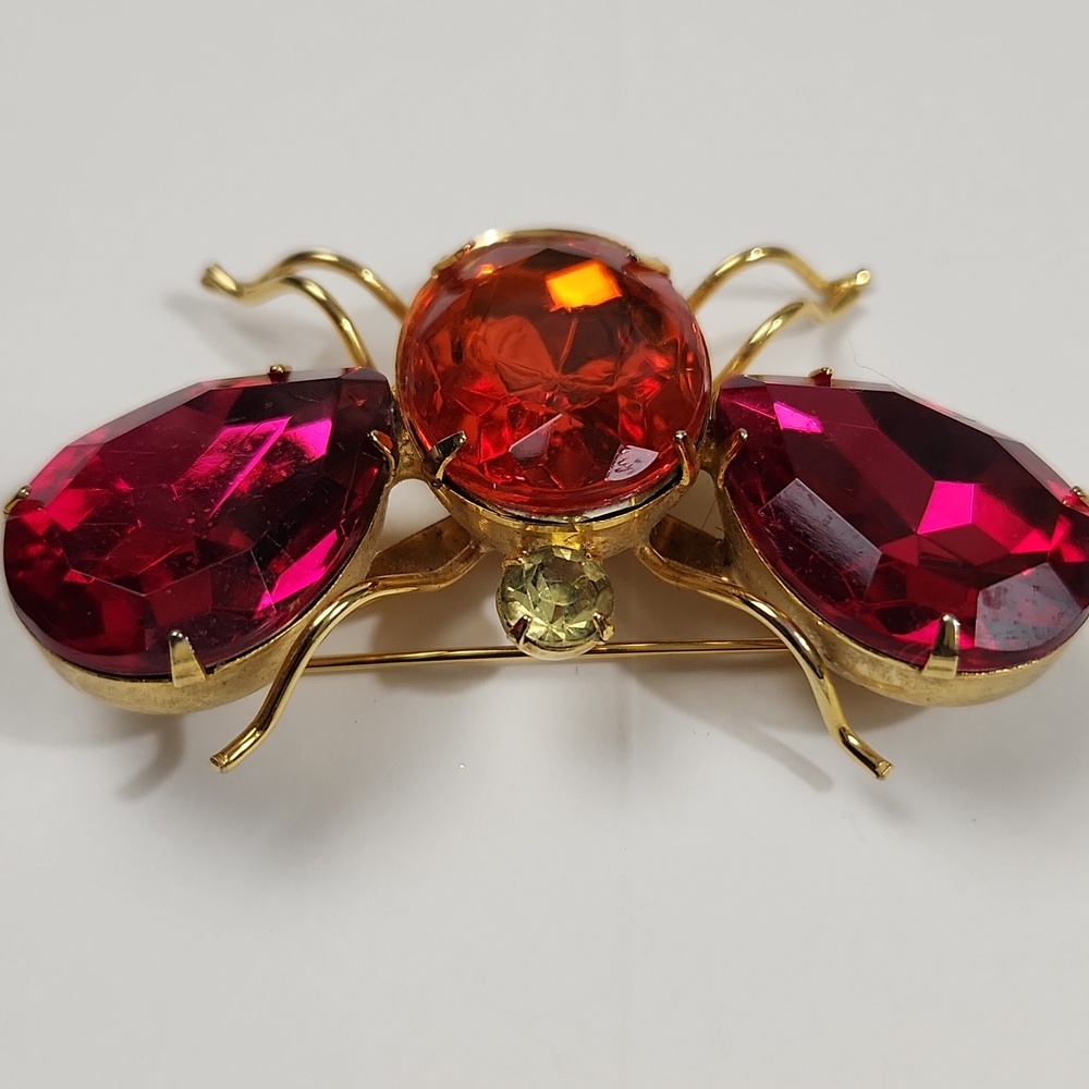 Mid-Century Gold-Tone Flying Insect Brooch with Magenta Teardrop Wings